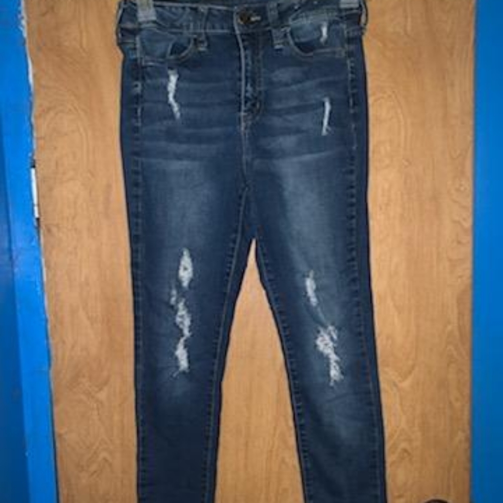 Ripped blue jeans